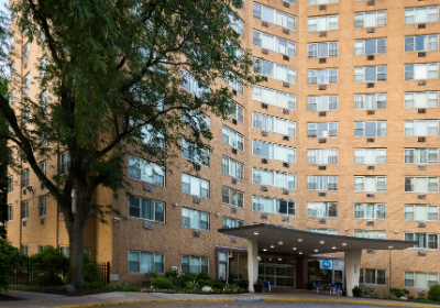 Exterior view of brick residential buildings at Yono apartments for rent in Philadelphia, PA